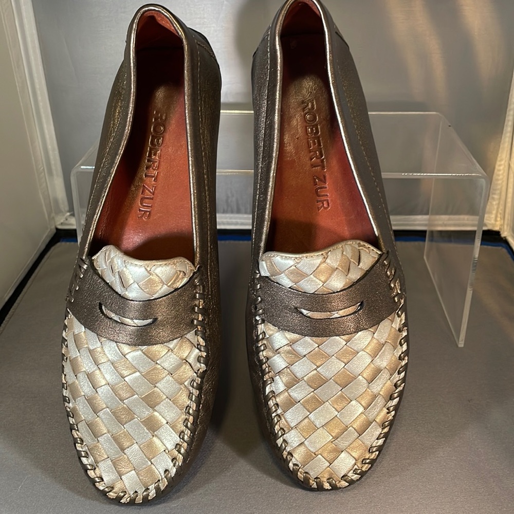 Robert Zur Bronze with checker board pattern on top in gold and silver.